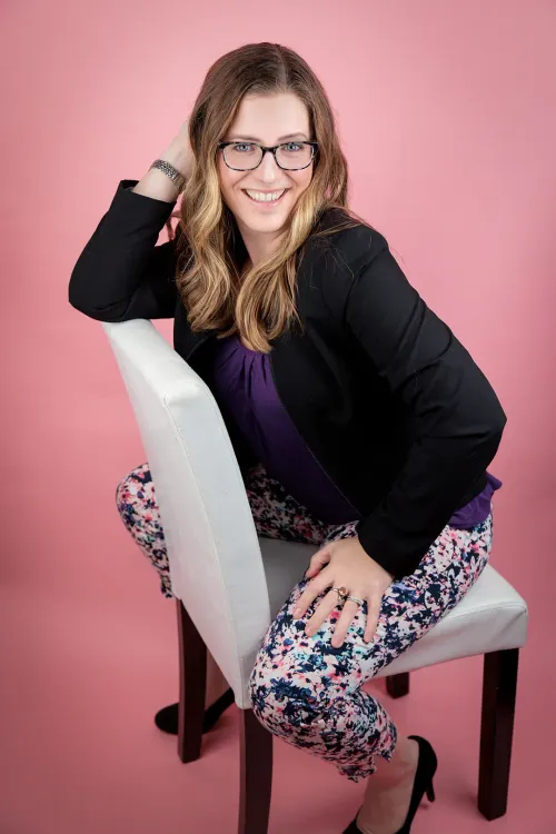 jill bilodeau posing in chair