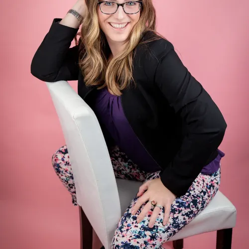 jill bilodeau posing in chair
